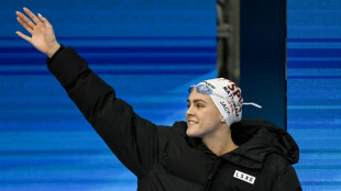 Australia's Jack out of swimming world titles with broken hand