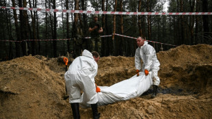 Ukraine says graves and 'torture centres' found in recaptured east