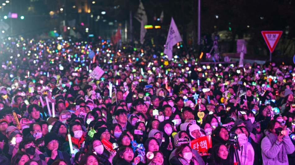 'I'm so happy': tears of joy, K-pop on Seoul streets as Yoon impeached