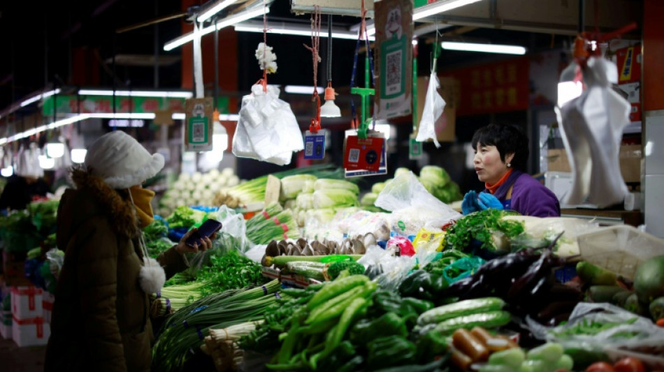 Hong Kong, Shanghai lead losers on mixed day for markets