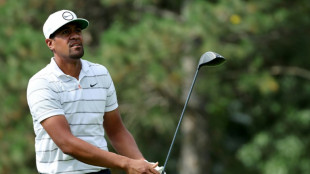 Finau rides momentum to share of PGA Tour lead in Detroit