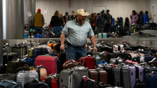 Travel misery grinds on as US digs out from superstorm