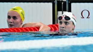 Ledecky in charge but Slovak swimmer collapses