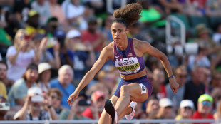 McLaughlin, Muhammad ease through hurdles heats