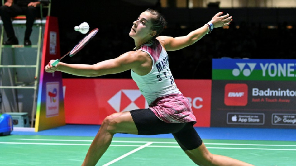 Marin vows to return to top after badminton worlds exit