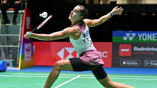 Marin vows to return to top after badminton worlds exit