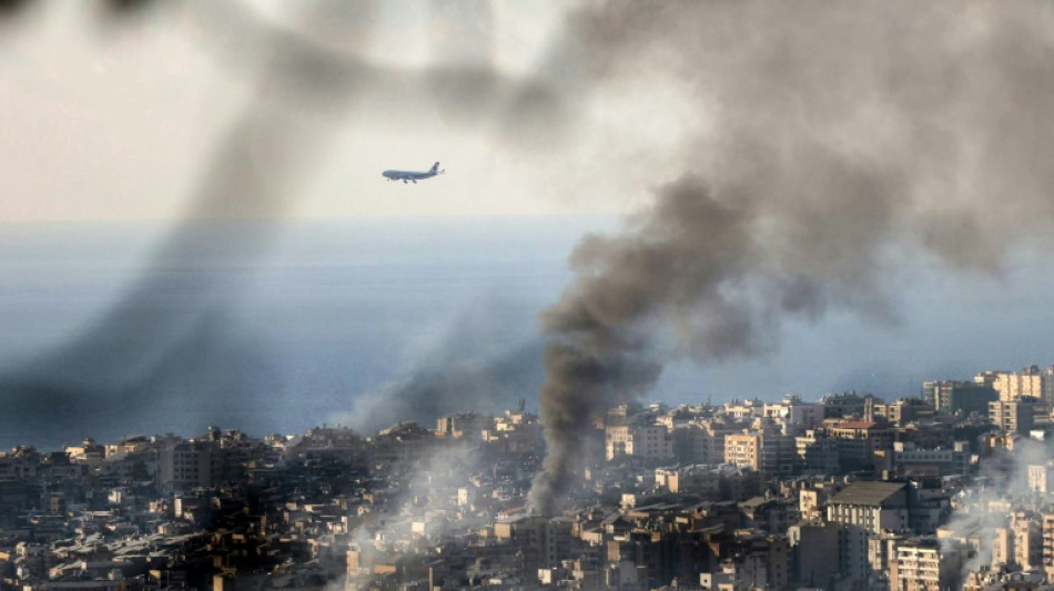 Israel bombs south Beirut after Hezbollah targets Haifa area