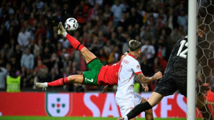 Ronaldo at double as Portugal reach Nations League quarters, Spain win