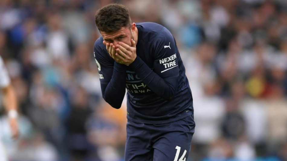 Laporte to miss start of Man City's title defence