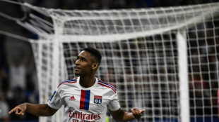 Tete double helps Lyon ease past Troyes