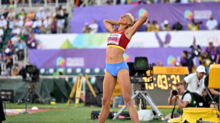 Venezuela's Rojas retains world triple jump title