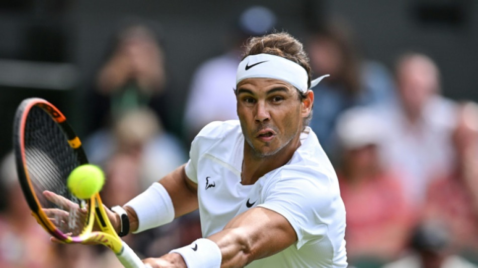 Nadal overcomes scare to reach Wimbledon second round