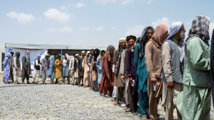 Hundreds of war-displaced Afghans return east