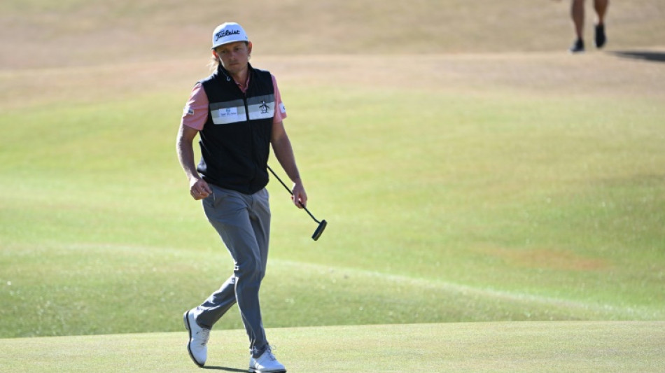 Aussie Smith leads British Open at halfway stage as emotional Woods bows out