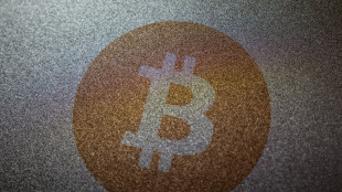 Asian markets mixed as traders weigh Fed; bitcoin above $90,000