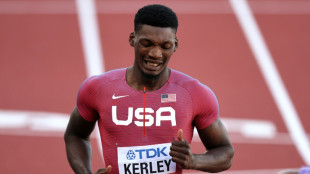 Kerley sprint double dream over, Lyles marches on