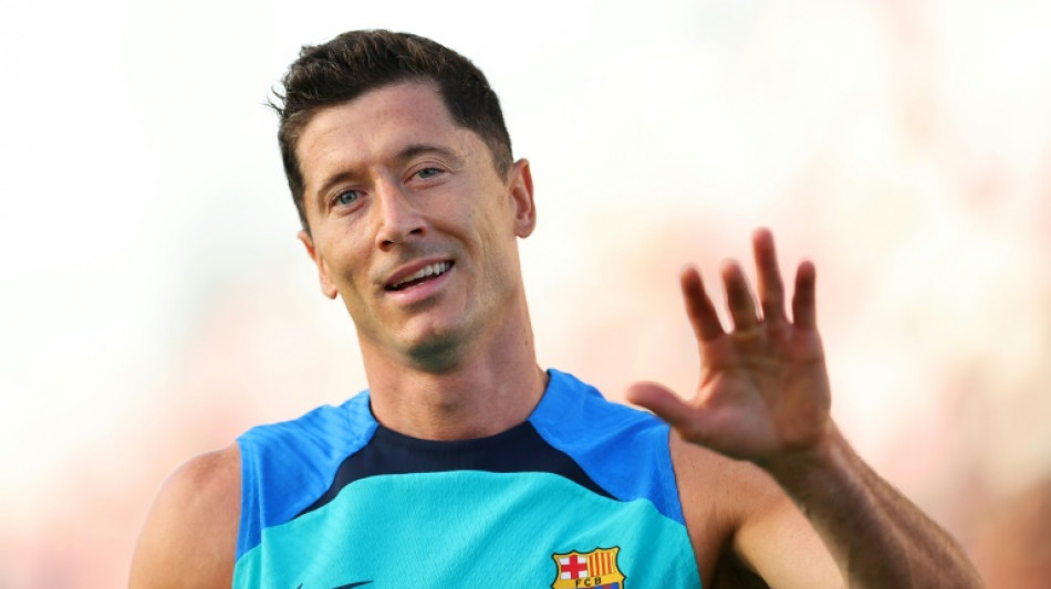 Lewandowski says 'hungry' for success at Barca unveiling