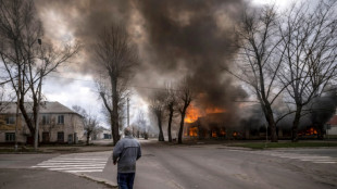 Civilians try to flee east Ukraine as Russia prepares attack