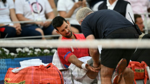 Djokovic survives injury scare to reach Olympics semi-finals