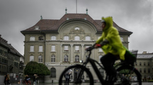 Swiss central bank cuts rate again amid strong franc worries