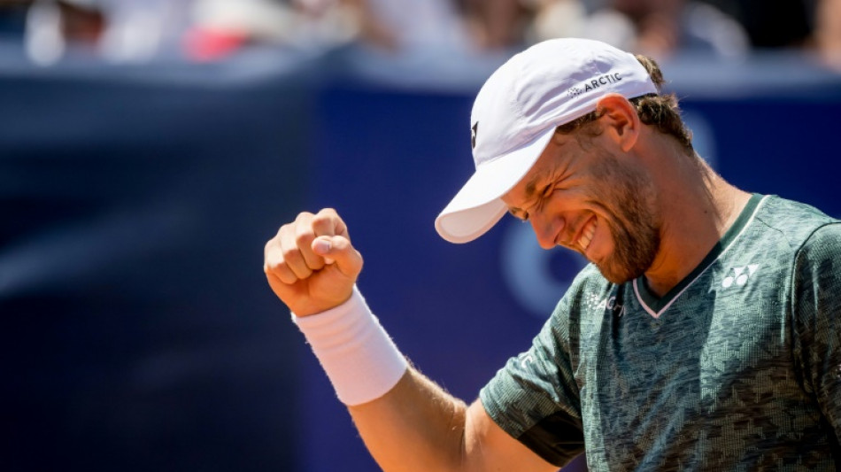 Ruud battles back to beat Berrettini in Gstaad