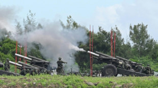 Taiwan holds military drill after China repeats threats