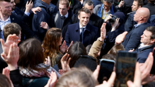 Macron attacks Le Pen as lead slips in French polls