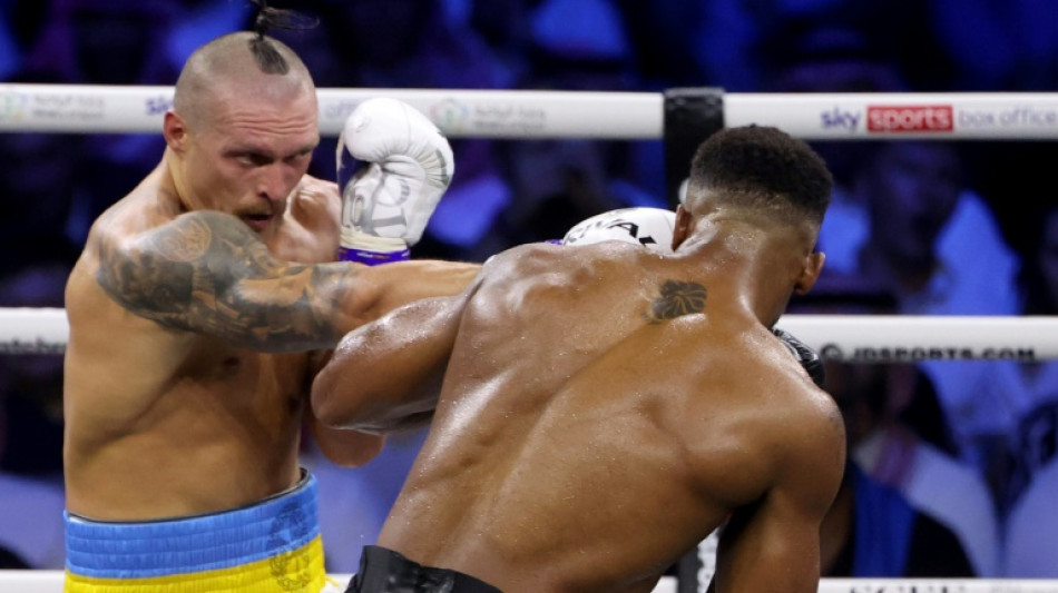 Usyk beats Joshua by split decision in heavyweight title fight