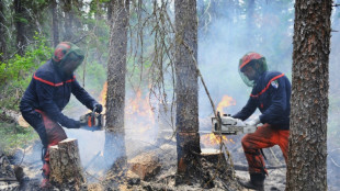 First firefighter death in Canada wildfires