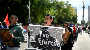 Thousands march to demand justice for Mexico's missing students