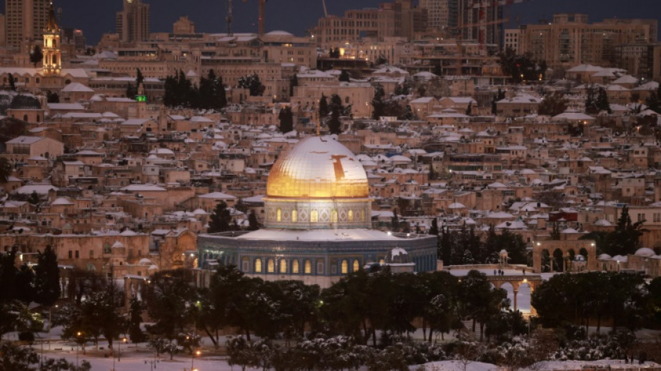 Rare Mideast snow brings Jerusalem joy, misery for Syria refugees