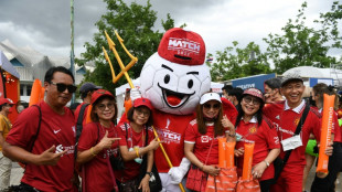 'Really happy': Thai fans of Man Utd, Liverpool paint Bangkok red