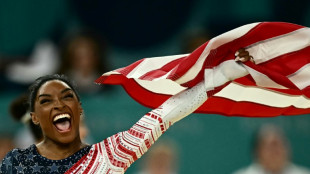Golden Biles makes more history as gender row rocks Paris Olympics